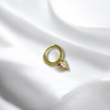 Arete dorado con punta cónica y zirconias | Luna Bella Joyería