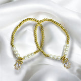 Pulsera Dorada de Acero Inoxidable con Perlas y Dije de Niña | Luna Bella Joyería